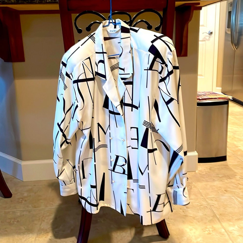 Vintage women’s shirt with shoulder pads